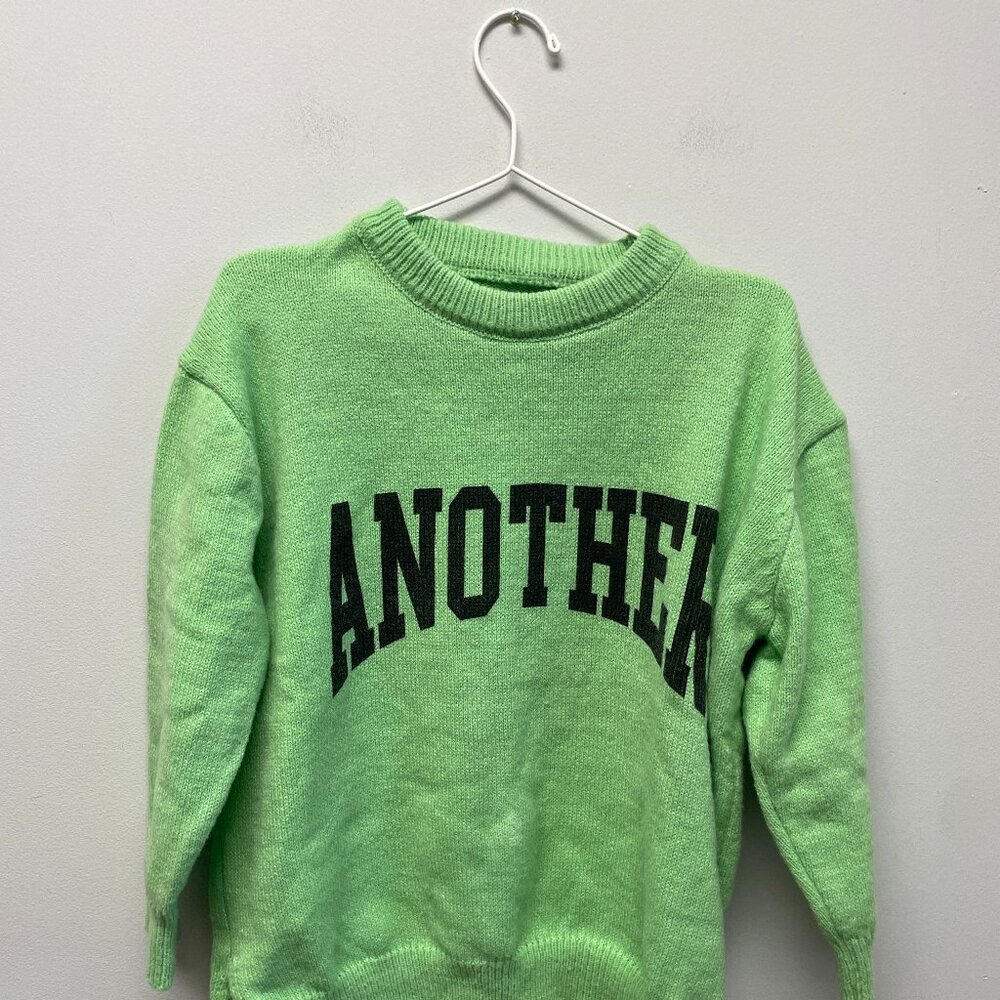 Bright green sweater